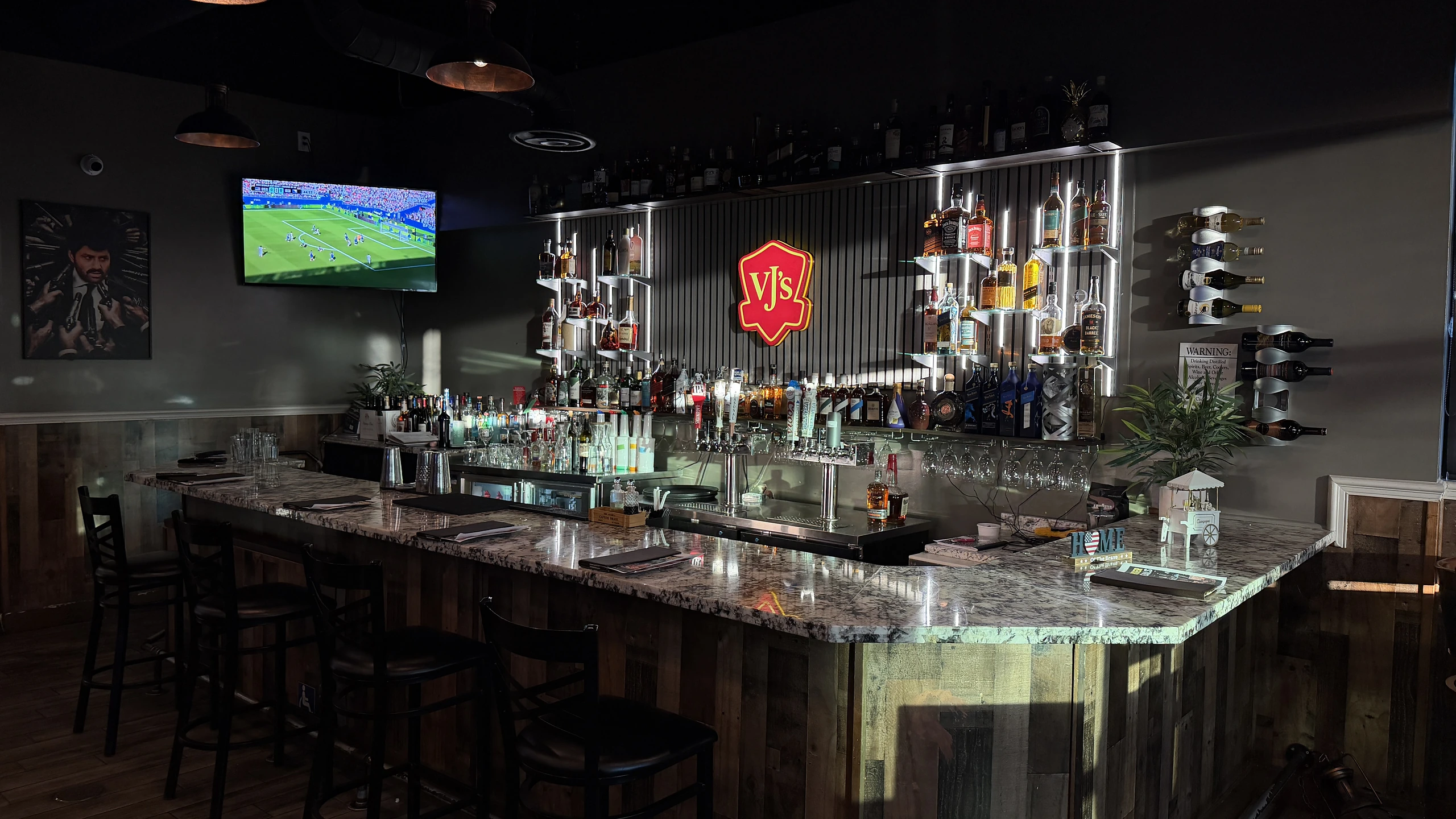 VJ’s own back bar with its whiskey and spirits collection